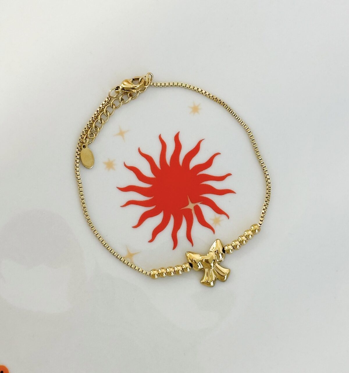 Armband strikje A010 Goud