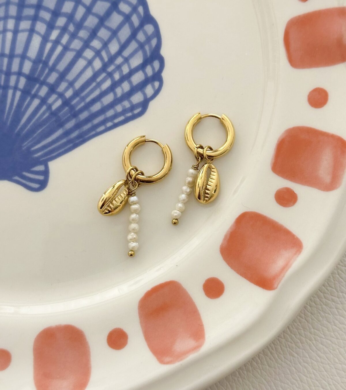 Oorbellen schelp O220 Goud